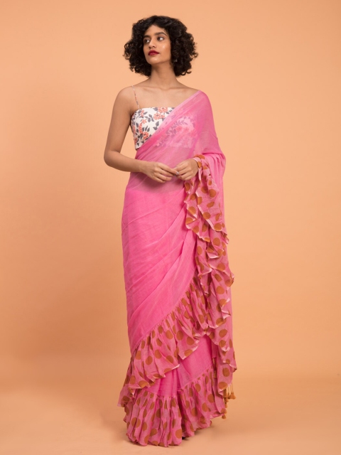 

Suta Pink Solid Pure Cotton Handloom Saree with Polka Printed Ruffle Border