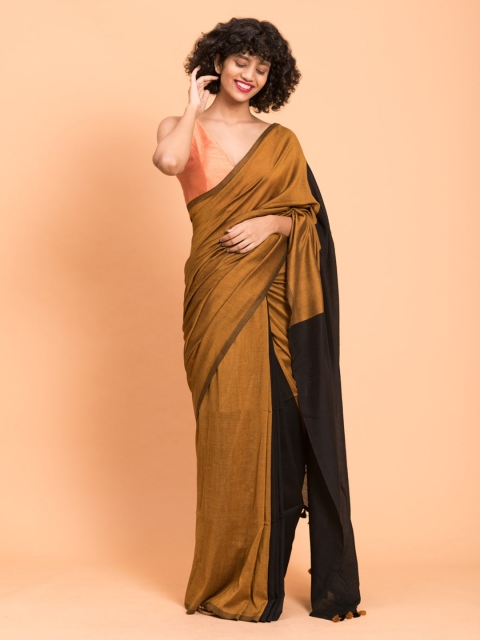 

Suta Gold-Toned and Black Colourblocked Saree