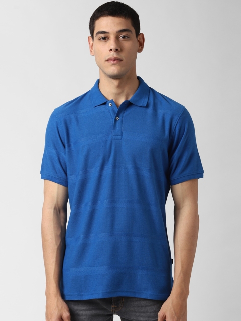 

Peter England Casuals Men Blue Solid Polo Collar T-shirt