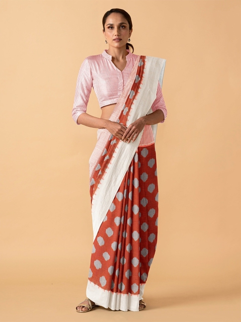 

Taneira Orange Printed Ikat Saree