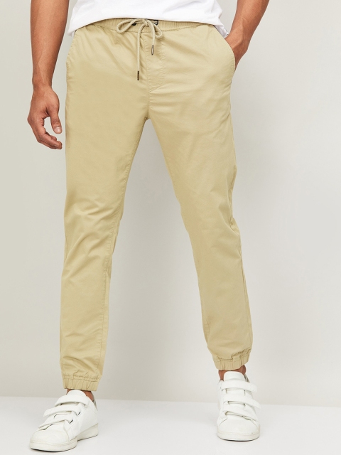 

UCLA Men Beige Slim Fit Solid Joggers