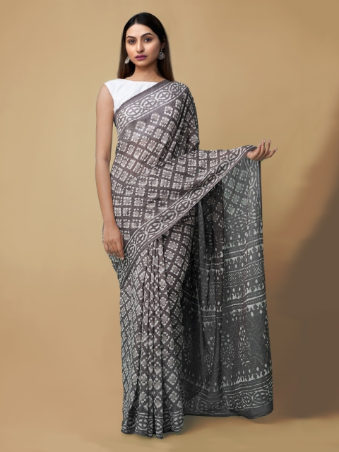 

Unnati Silks Grey & White Pure Cotton Printed Dabu Handloom Saree