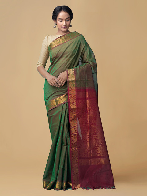 

Unnati Silks Green Pure Cotton Solid Gadwal Saree