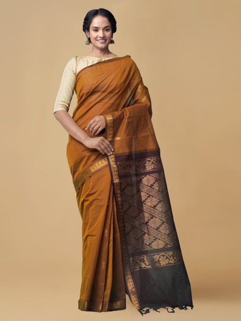 

Unnati Silks Yellow Pure Cotton Solid Garad Saree