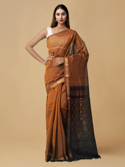 

Unnati Silks Mustard Pure Cotton Solid Handloom Garad Saree