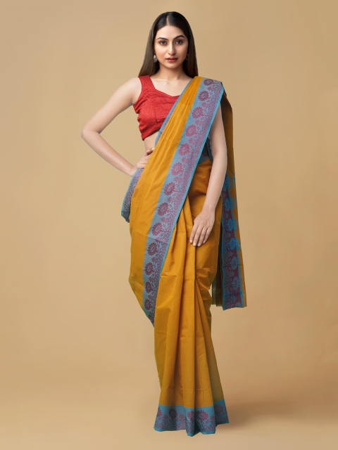 

Unnati Silks Orange Pure Cotton Solid Venkatgiri Saree