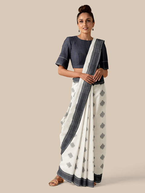 

Taneira Beige Pure Cotton Woven Design Ikat Saree
