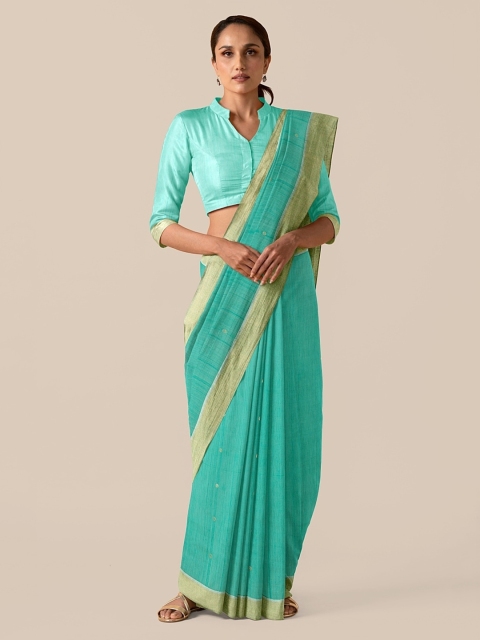 

Taneira Green Silk Cotton Woven Design Chanderi Saree