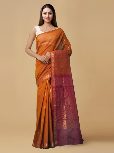 

Unnati Silks Orange Pure Cotton Solid Garad Saree