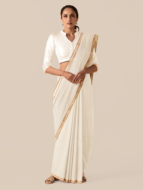 

Taneira Beige Silk Cotton Solid Chanderi Saree