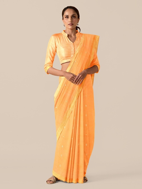 

Taneira Orange Silk Cotton Solid Chanderi Saree