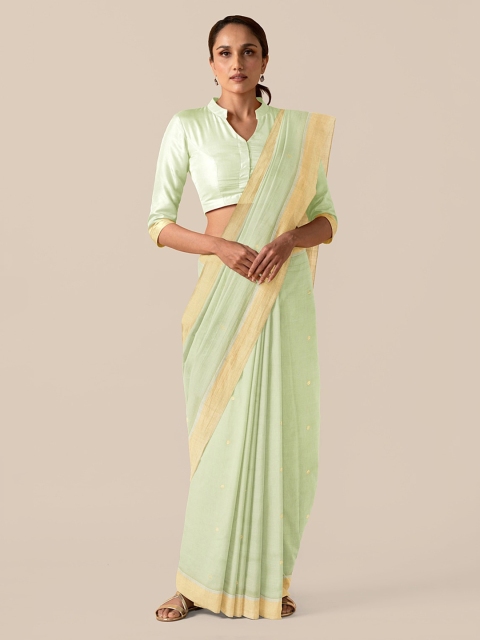 

Taneira Green & Gold-Toned Silk Cotton Solid Chanderi Saree
