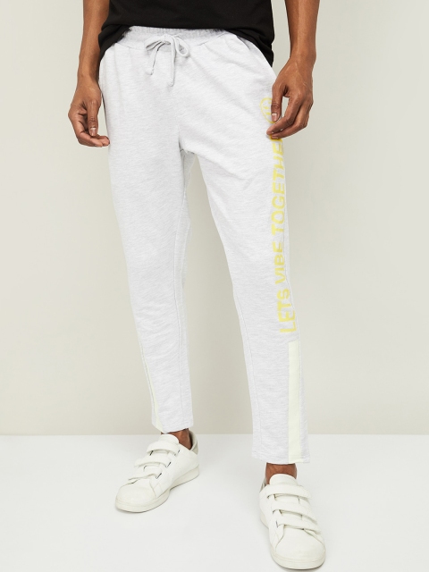 

Smiley World Men White Solid Track Pants