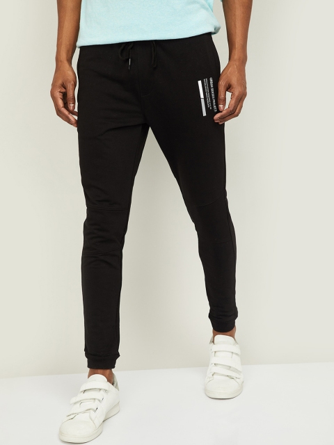 

Bossini Men Black Solid Straight-Fit Track Pants