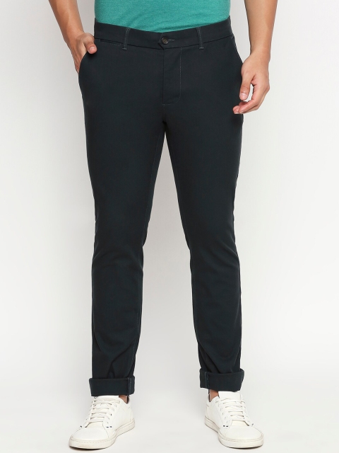 

Basics Men Dark Green Tapered Fit Solid Regular Trousers, Olive