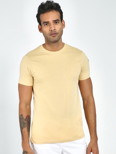 

Blue Saint Men Beige Solid Round Neck T-shirt