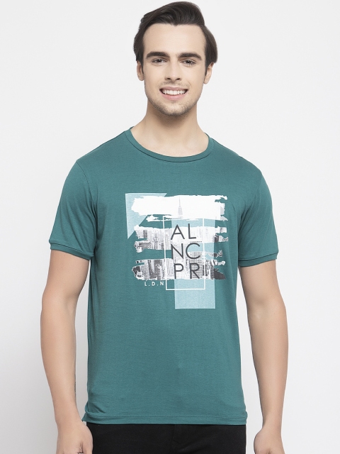 

Allen Cooper Men Teal Blue & Off-White Printed Round Neck T-shirt