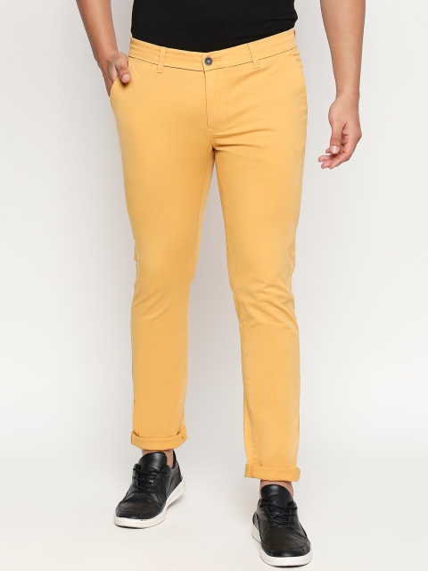 

Basics Men Orange Tapered Fit Solid Regular Trousers