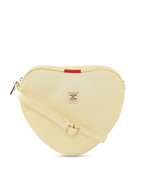 

ESBEDA Yellow Textured Heart Shaped Sling Bag