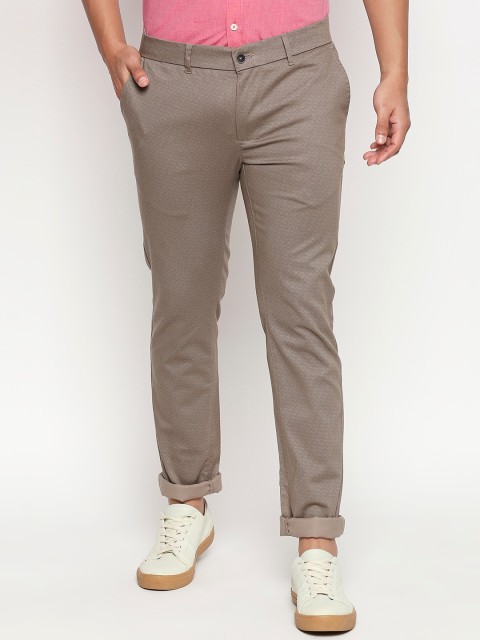 

Basics Men Brown Tapered Fit Self Design Regular Trousers