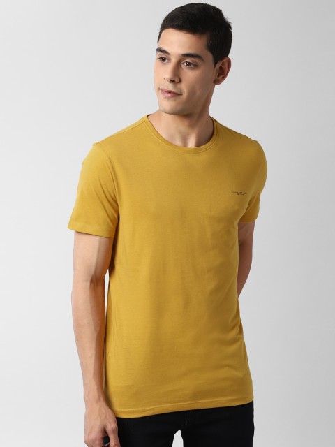 

Peter England Casuals Men Yellow Solid Round Neck T-shirt