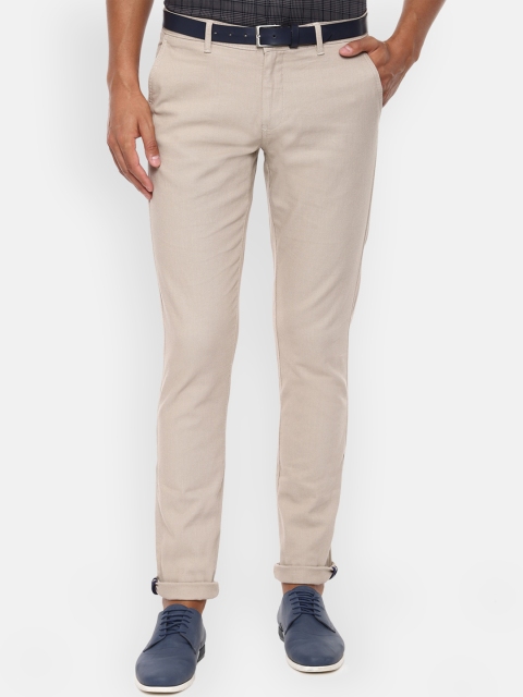 

Van Heusen Sport Men Beige Slim Fit Solid Regular Trousers