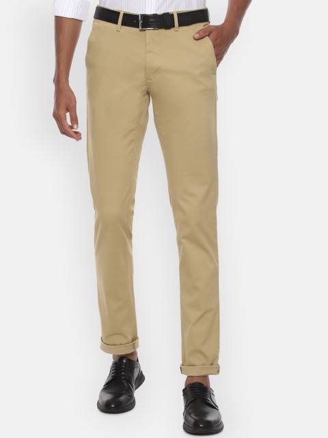 

Van Heusen Sport Men Beige Slim Fit Solid Regular Trousers