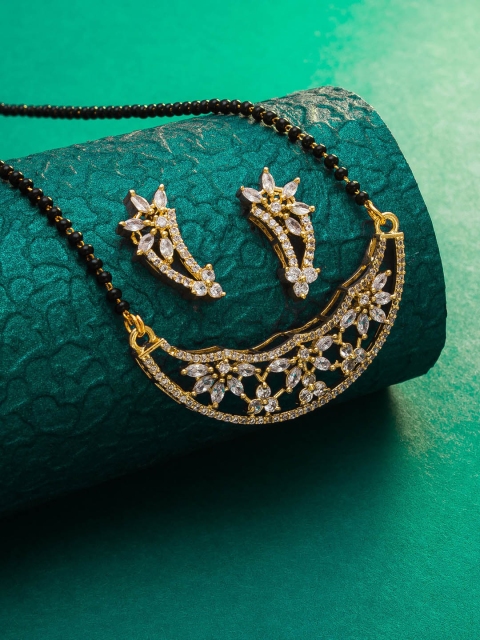 

aadita Gold-Plated Black & White AD-Studded & Beaded Mangalsutra With Earrings