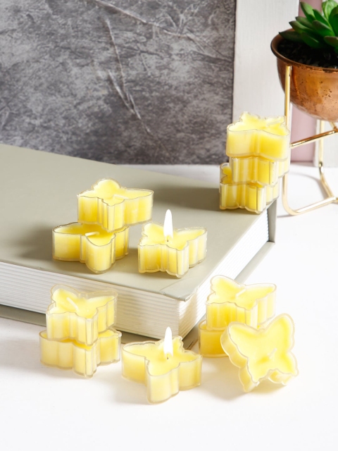 

Aapno Rajasthan Set Of 12 Yellow Butterfly Shaped Plastic Candles