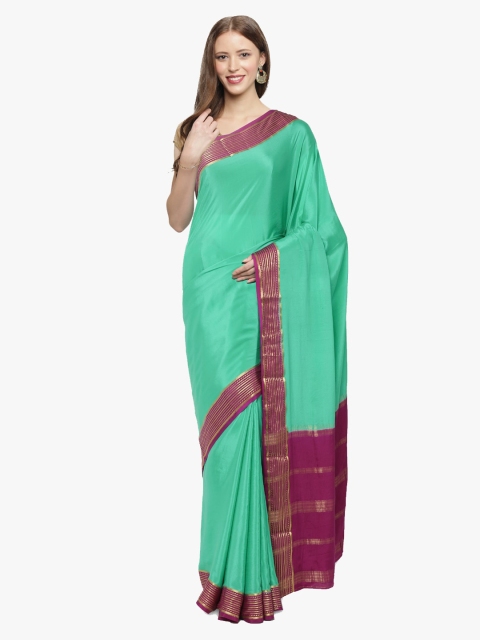 

Sudarshan Silks Sea Green & Magenta Pure Silk Solid Mysore Silk Saree
