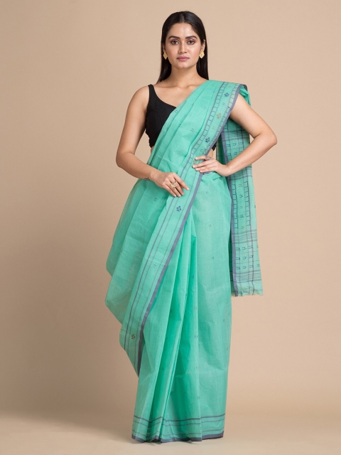 

Mitera Sea Green Pure Cotton Solid Hand Woven Buti Work Taant Saree