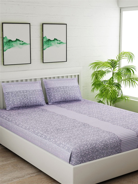 

Salona Bichona Lavender & Off-White Ethnic Motifs 180 TC Cotton 1 Queen Bedsheet with 2 Pillow Covers