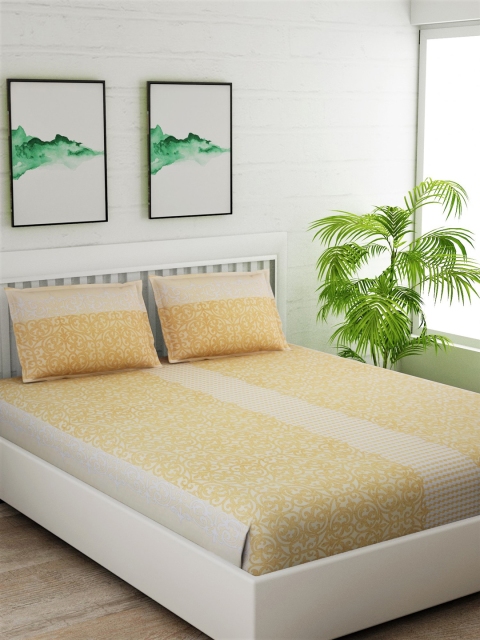 

Salona Bichona Yellow & White Abstract 180 TC Cotton 1 Queen Bedsheet with 2 Pillow Covers