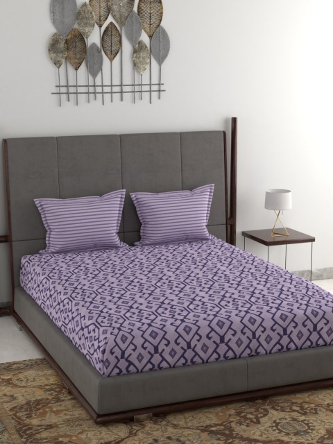 

Trident Purple & Navy Blue Geometric 120 TC Cotton 1 Queen Bedsheet with 2 Pillow Covers