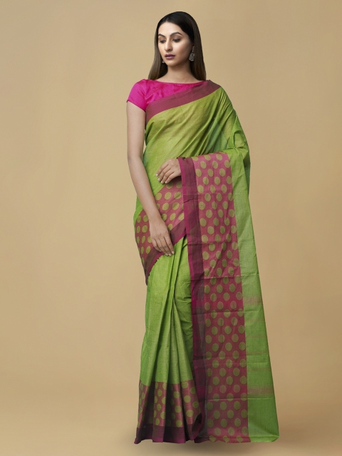 

Unnati Silks Green Pure Cotton Solid Kanjeevaram Saree