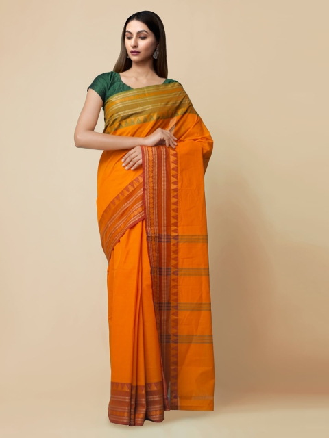 

Unnati Silks Orange Pure Cotton Solid Kanjeevaram Saree