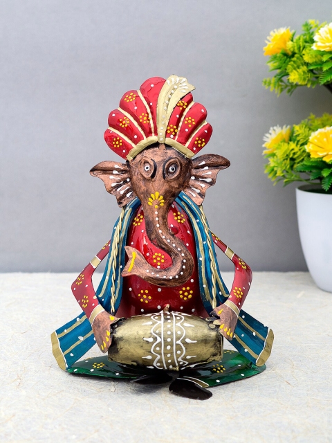 

Golden Peacock Red & Blue Handcrafted Ganesha Playing Dholak Instruments