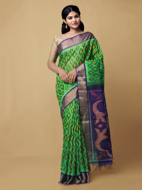 

Unnati Silks Green & Blue Ethnic Motifs Silk Cotton Handloom Ikat Saree
