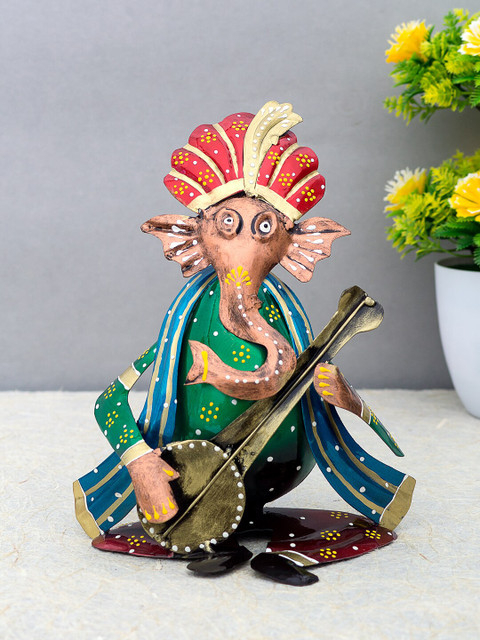 

Golden Peacock Green & Blue Handcrafted Ganesha Playing Sitar Instrument Showpiece