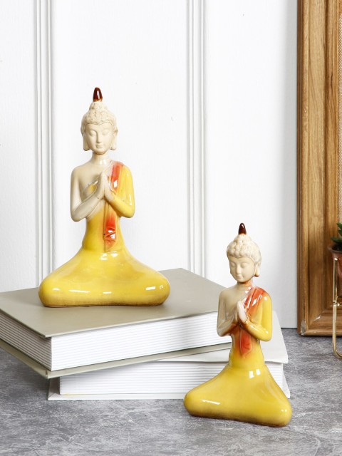 

TAYHAA Set of 2 Yellow & Beige Tranquil Buddha Showpieces