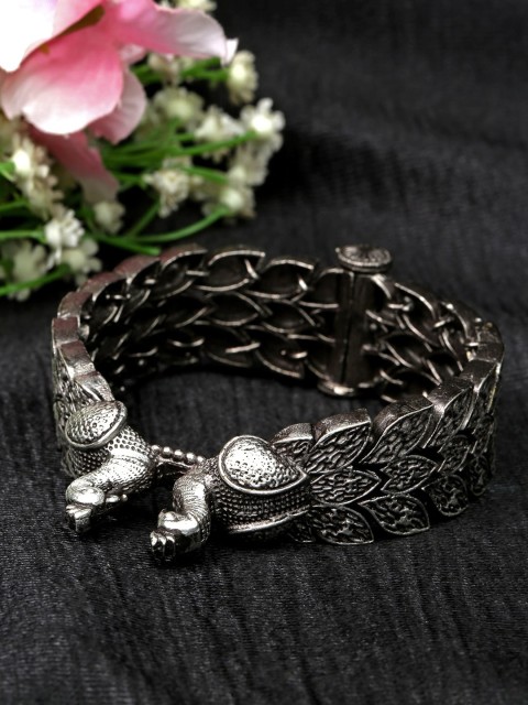 

Moedbuille Peacock Shape Detailing Tribal Style Antique Silver Plated Handcrafted Brass Bracelet
