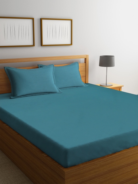 

Trident Teal Solid 144 TC Cotton 1 Queen Bedsheet with 2 Pillow Covers