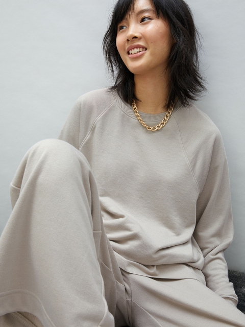 

H&M Women Beige Solid Sweatshirt