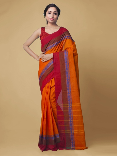 

Unnati Silks Orange Pure Cotton Solid Kanjeevaram Saree