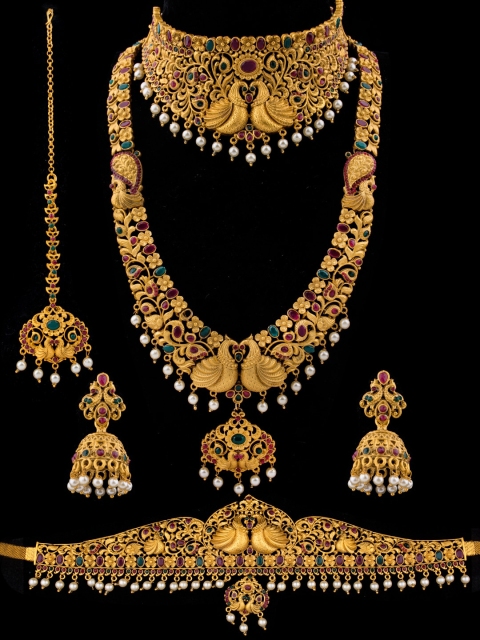 

Alankruthi Gold-Plated Red & Green Stone-Studded Beaded Temple Bridal Jewellery Set