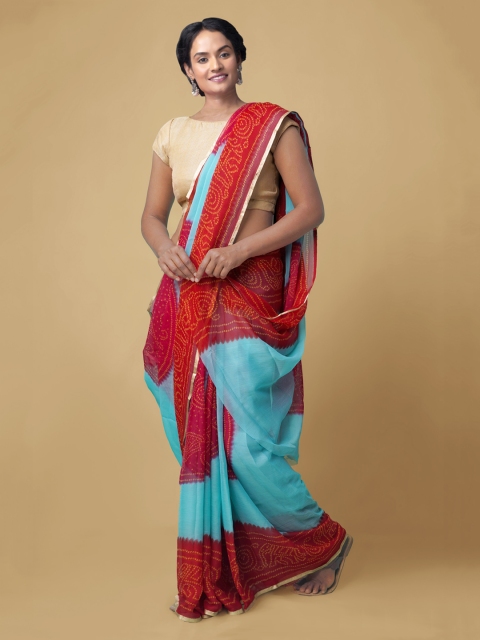 

Unnati Silks Turquoise Blue & Red Pure Chiffon Printed Baluchari Saree