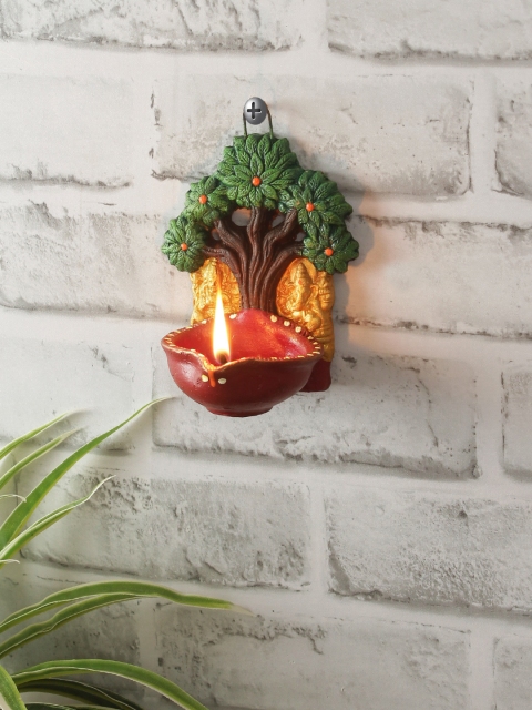 

Aapno Rajasthan Green & Brown Handcrafted Laxmi Ganesh Hanging Deepak Showpiece