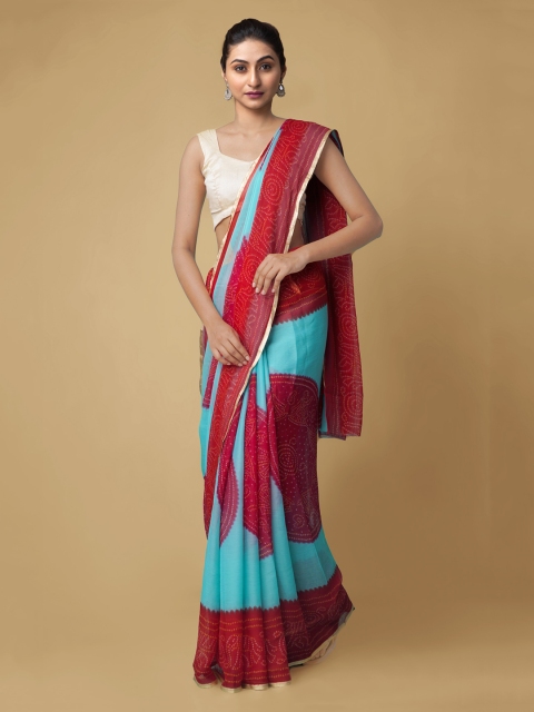 

Unnati Silks Blue & Red Pure Chiffon Colourblocked Baluchari Saree