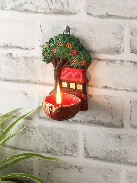 

Aapno Rajasthan Green & Red Handcrafted Terracotta Village Theme Wall Hanging