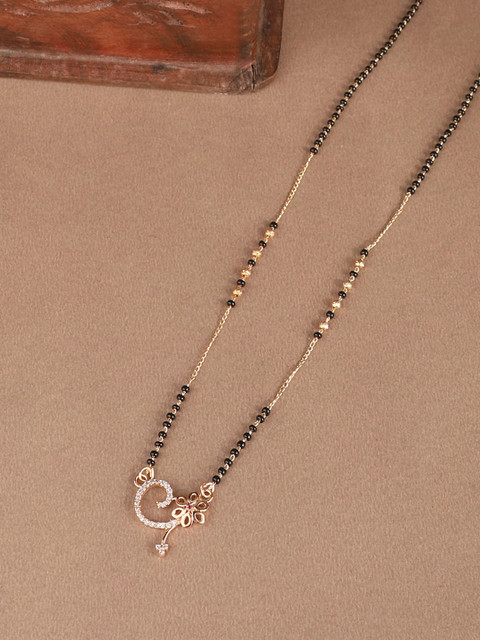 

ANIKAS CREATION Gold-Plated Black & White AD-Studded Beaded Traditional Mangalsutra